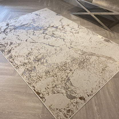Gold- und cremefarbener Bodenteppich - Niederfloriger Stil mit Marmoreffekt