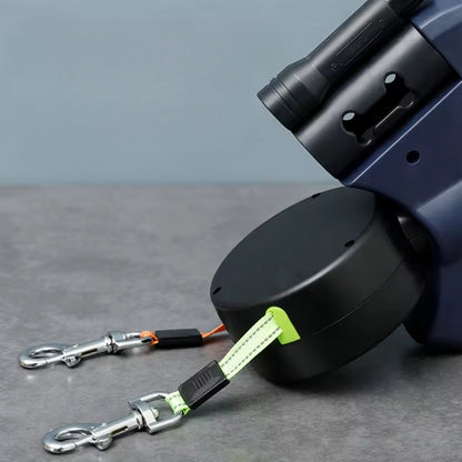 Zwei-Hunde-Gehleine - 360° drehbar und versenkbar mit Abfallbeutelhalter